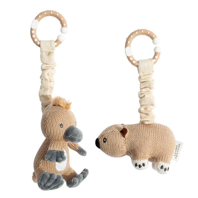 Two knitted animal toys with rattles on a white background