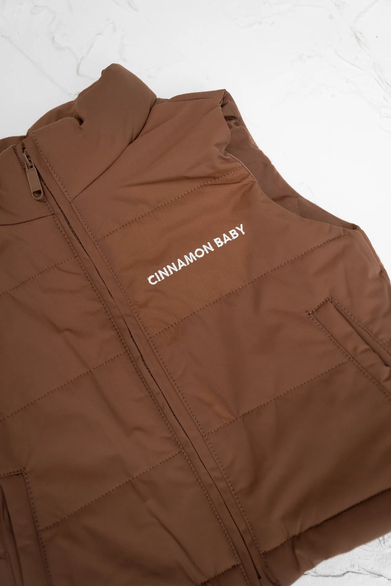 CINNAMON BABY PUFFER VEST - CHOCOLATE