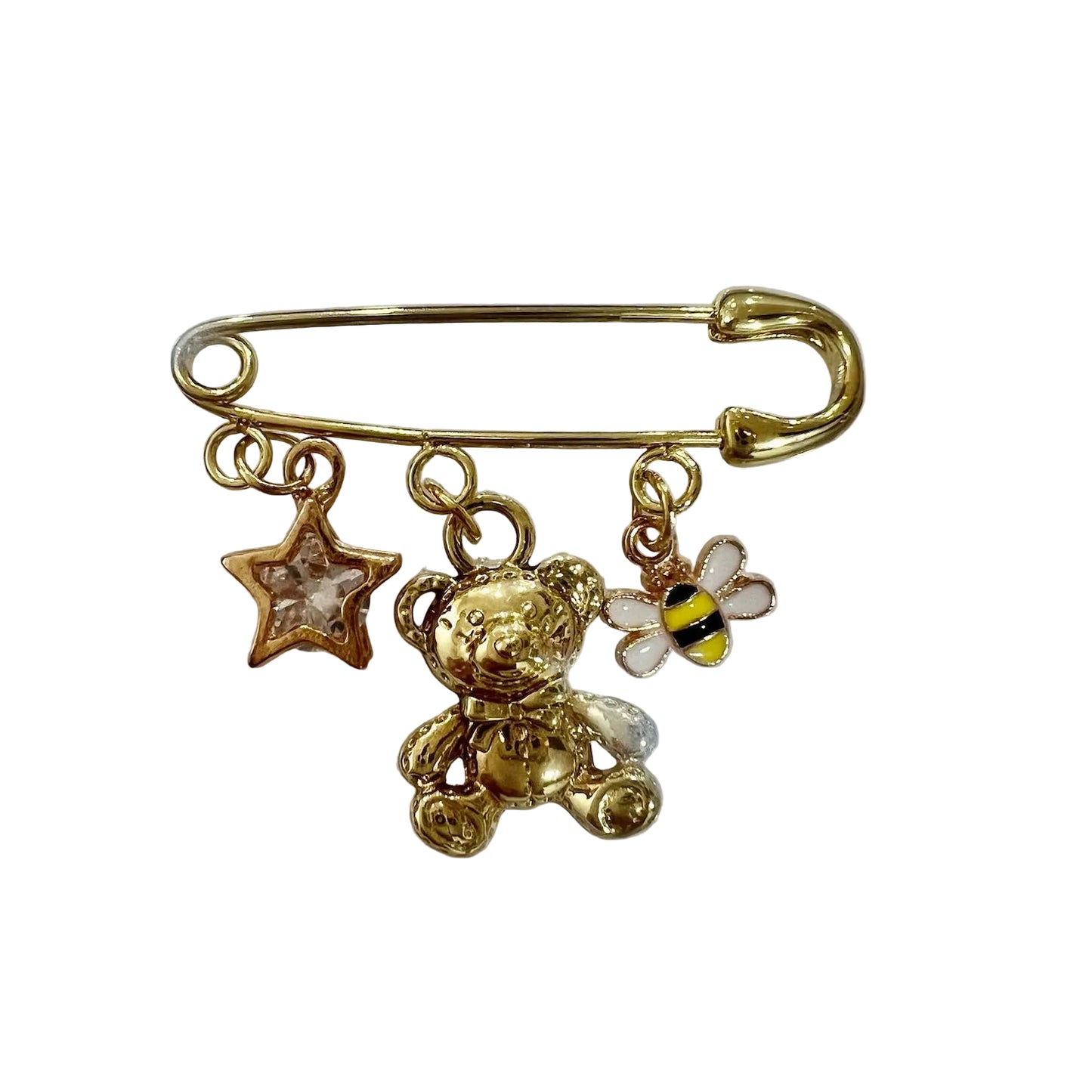 Gold-colored brooch with teddy bear and star charm on a white background