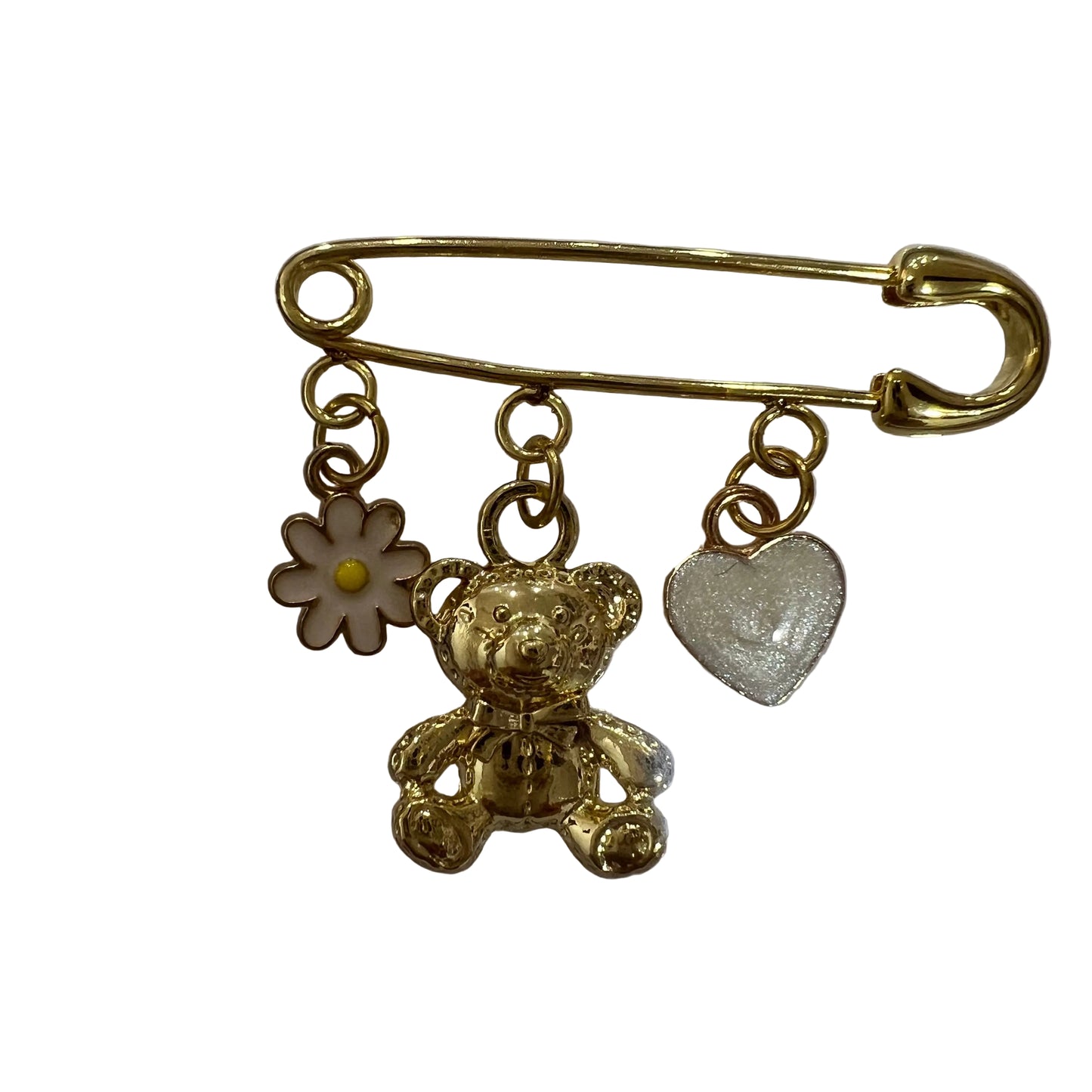 Gold-colored brooch with teddy bear, flower, and heart charms on a white background