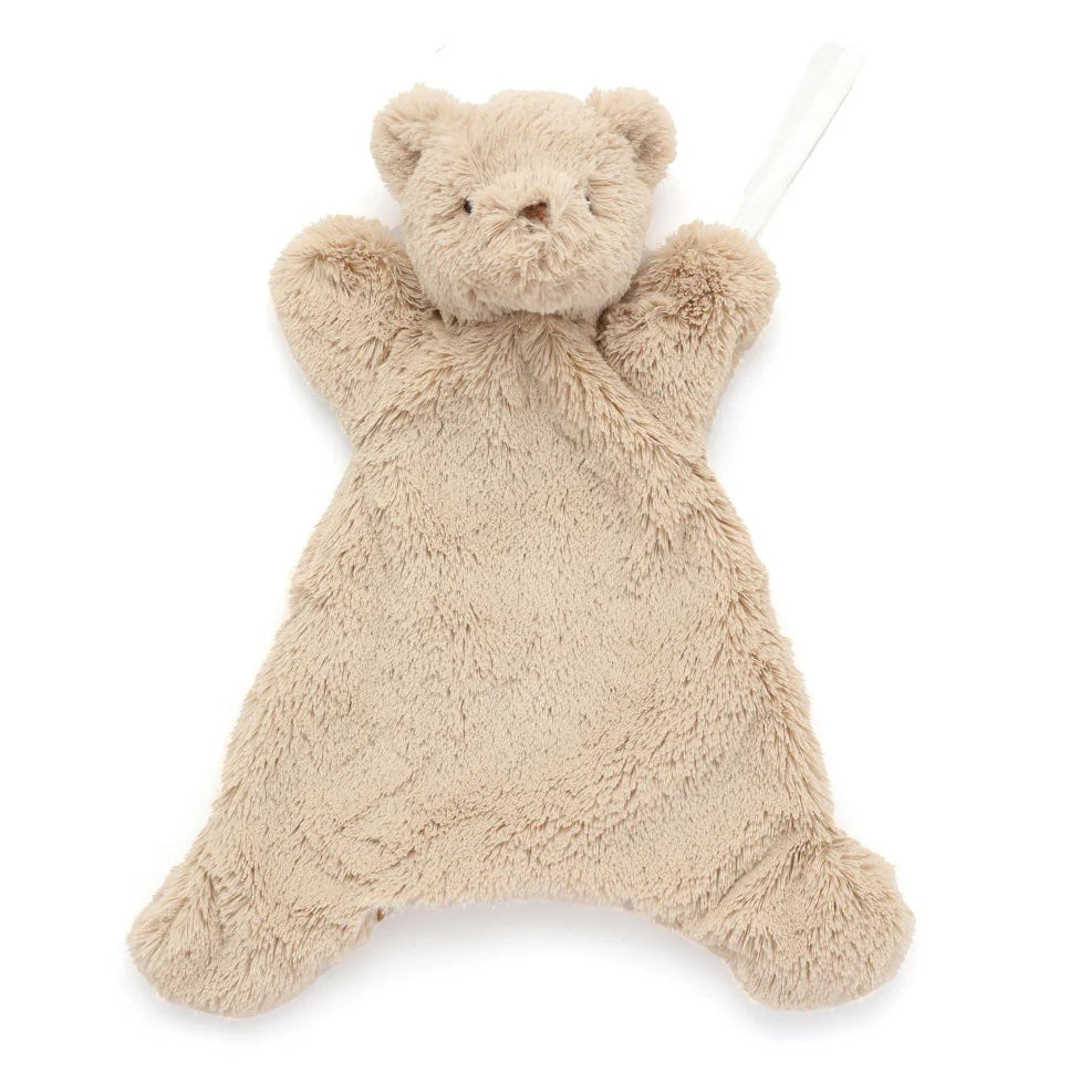 Beige teddy bear-shaped comfort blanket on a white background