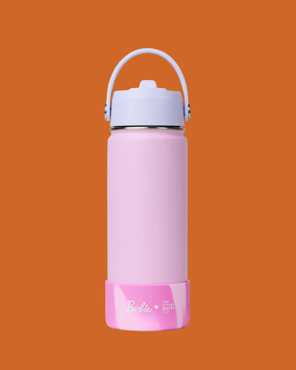 Pink water bottle with a white lid on a white background