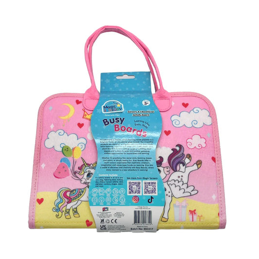 Pink busy board with unicorn design and packaging on a white background