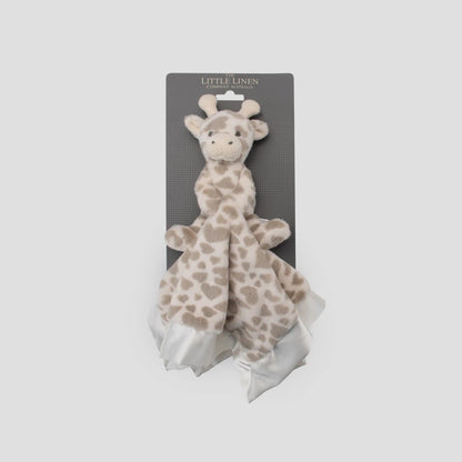 Giraffe-shaped安抚玩具在灰色包装盒中的特写