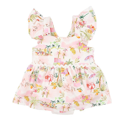 A baby girl's tiered romper dress in light pink with a colorful tropical beach-themed print, featuring ruffled shoulder straps and a gathered skirt.