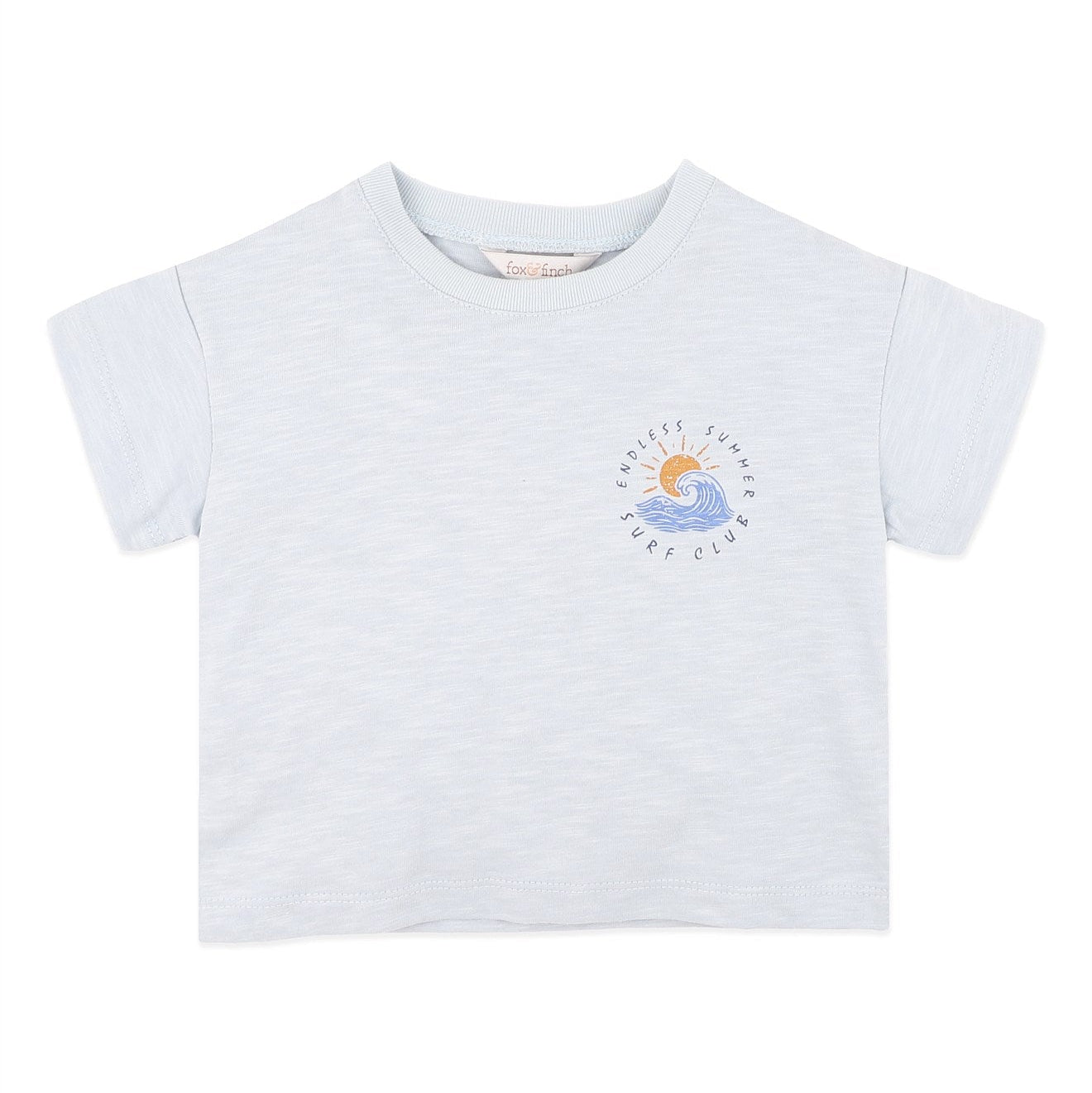 A light heather gray short-sleeve t-shirt for kids, featuring a small circular graphic on the left chest with a blue wave, a yellow sun, and the text 'SUNSHINE SEA DAY CLUB'.