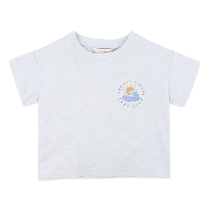 A light heather gray short-sleeve t-shirt for kids, featuring a small circular graphic on the left chest with a blue wave, a yellow sun, and the text 'SUNSHINE SEA DAY CLUB'.