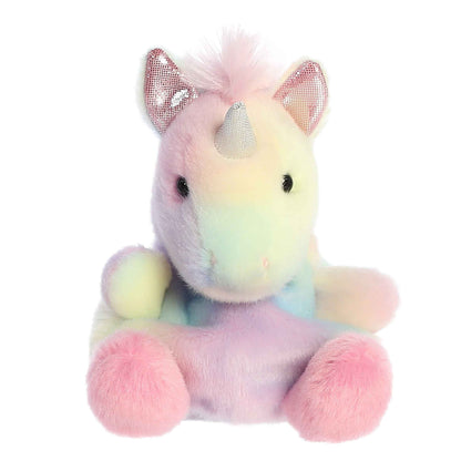 Pastel-colored unicorn plush toy with a shiny horn on a white background