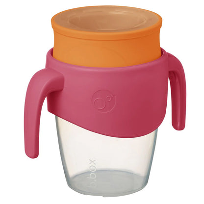 Clear cup with pink handle and orange lid on a white background