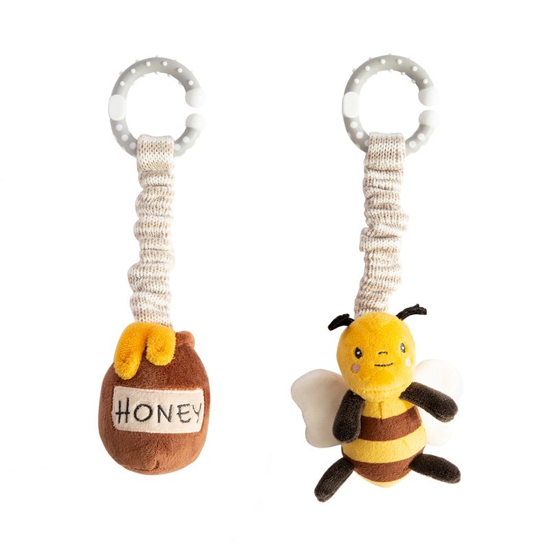 Plush bee and honeycomb toy with a carabiner on a white background