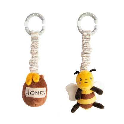 Plush bee and honeycomb toy with a carabiner on a white background