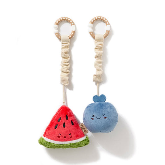 Plush toy with watermelon and whale design on a white background