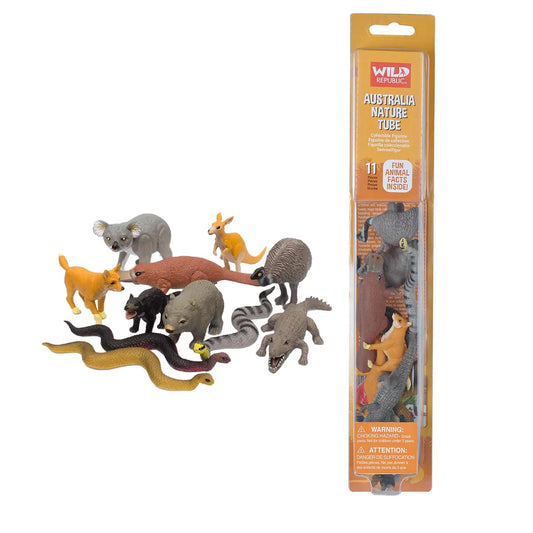 Set of toy animals in front of their packaging on a white background