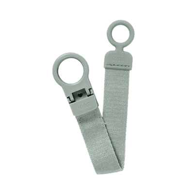Two light gray straps with circular ends on a white background