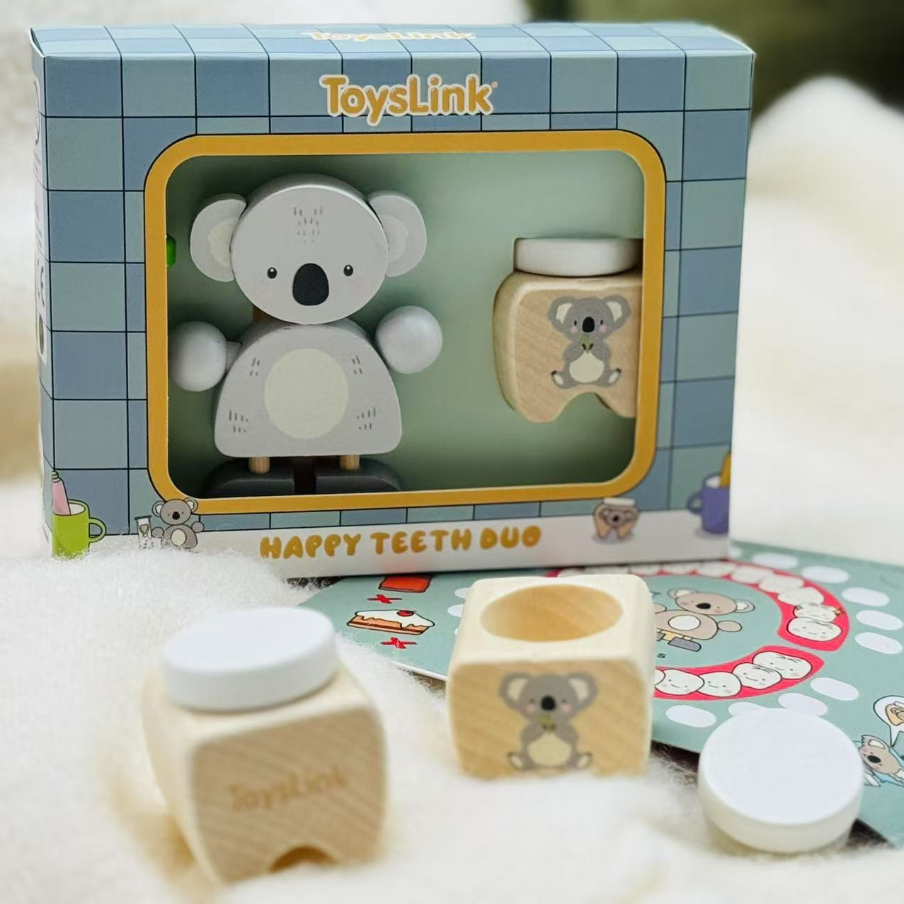 ToysLink Happy Teeth Duo set with packaging on a soft surface