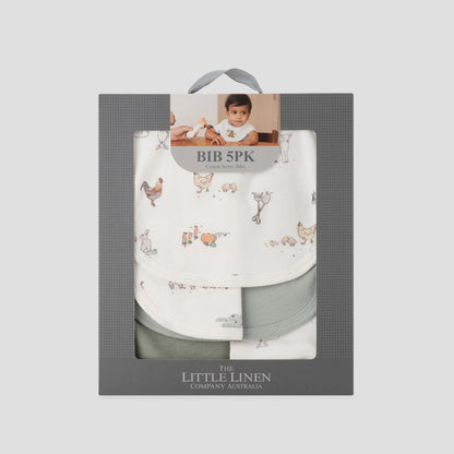 Packaged baby bib with animal pattern in a gray box on a light gray background
