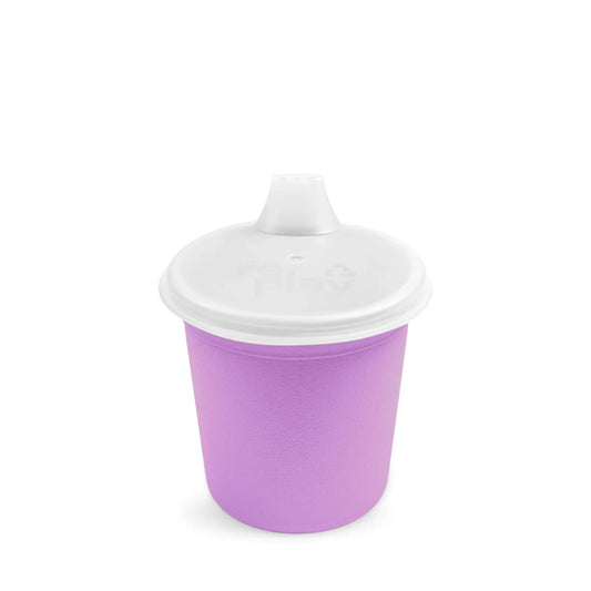 Purple sippy cup with a white lid on a white background
