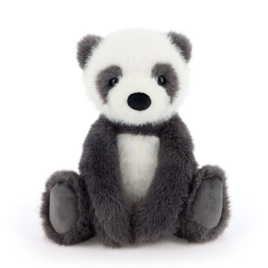 A plush panda toy sitting upright against a clean white background. The stuffed animal has a white face and chest, dark gray arms and legs, and gray ear patches and paw pads.
