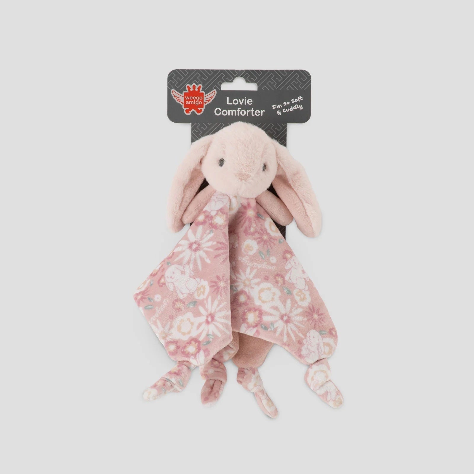 Floral comforter with a bunny design on a white background