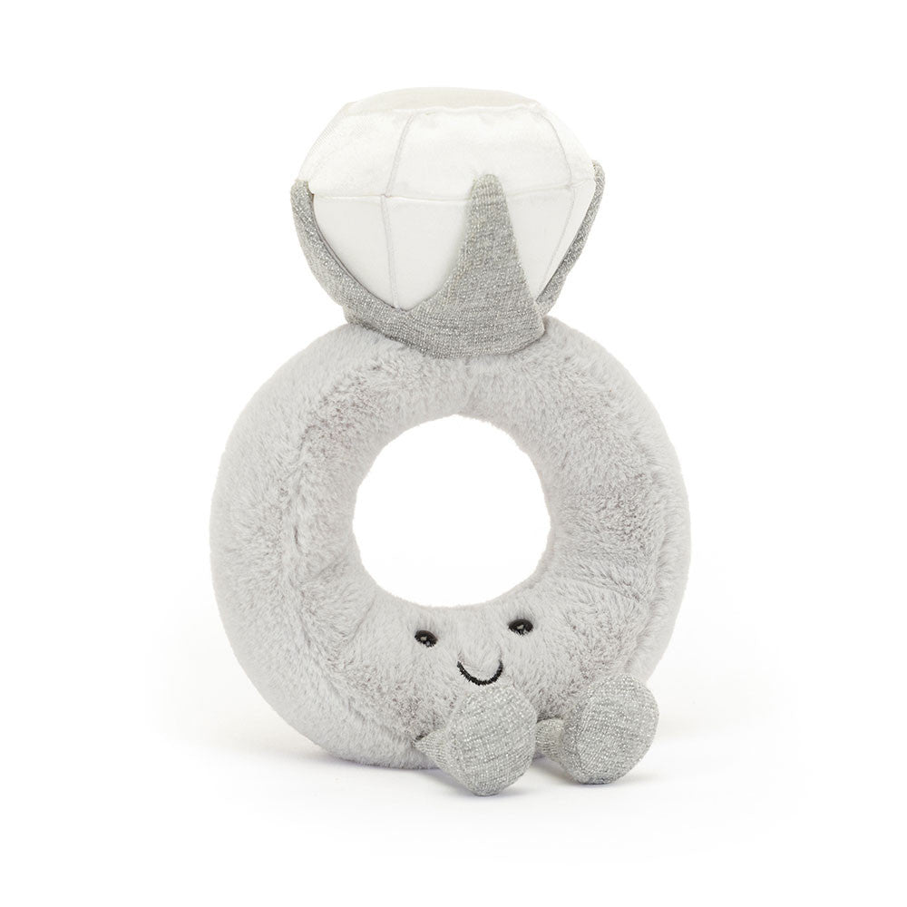 Gray plush letter 'Q' toy with a smiling face on a white background