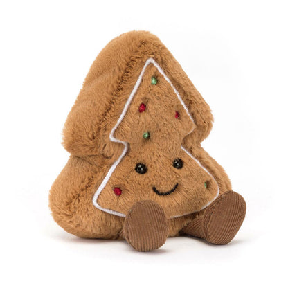 Plush gingerbread tree toy with a smiley face on a white background