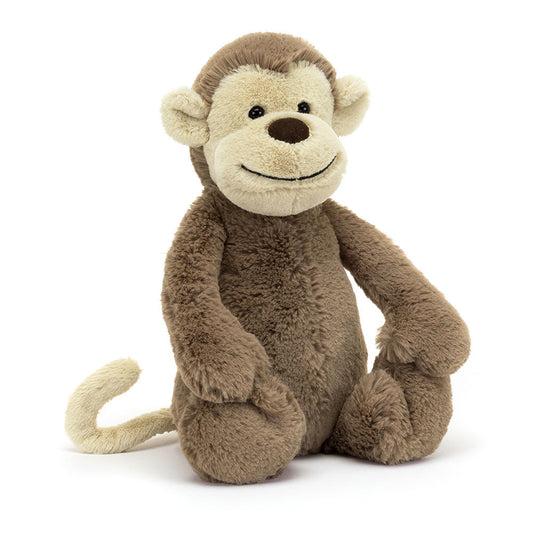Stuffed monkey toy on a white background