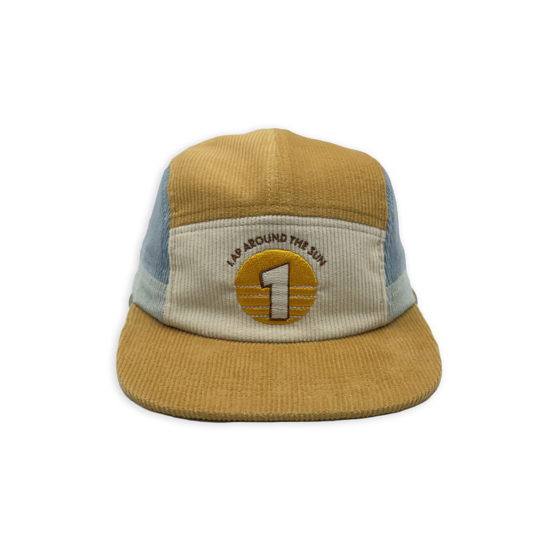 A five-panel trucker hat made of tan corduroy with light blue mesh side panels and a cream front panel. The front features an embroidered circular patch with a large number 1 and the text 'I'M AROUND THE WORLD'.