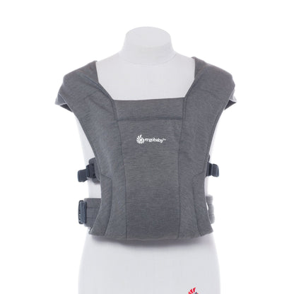 Gray baby carrier on a mannequin with a white background