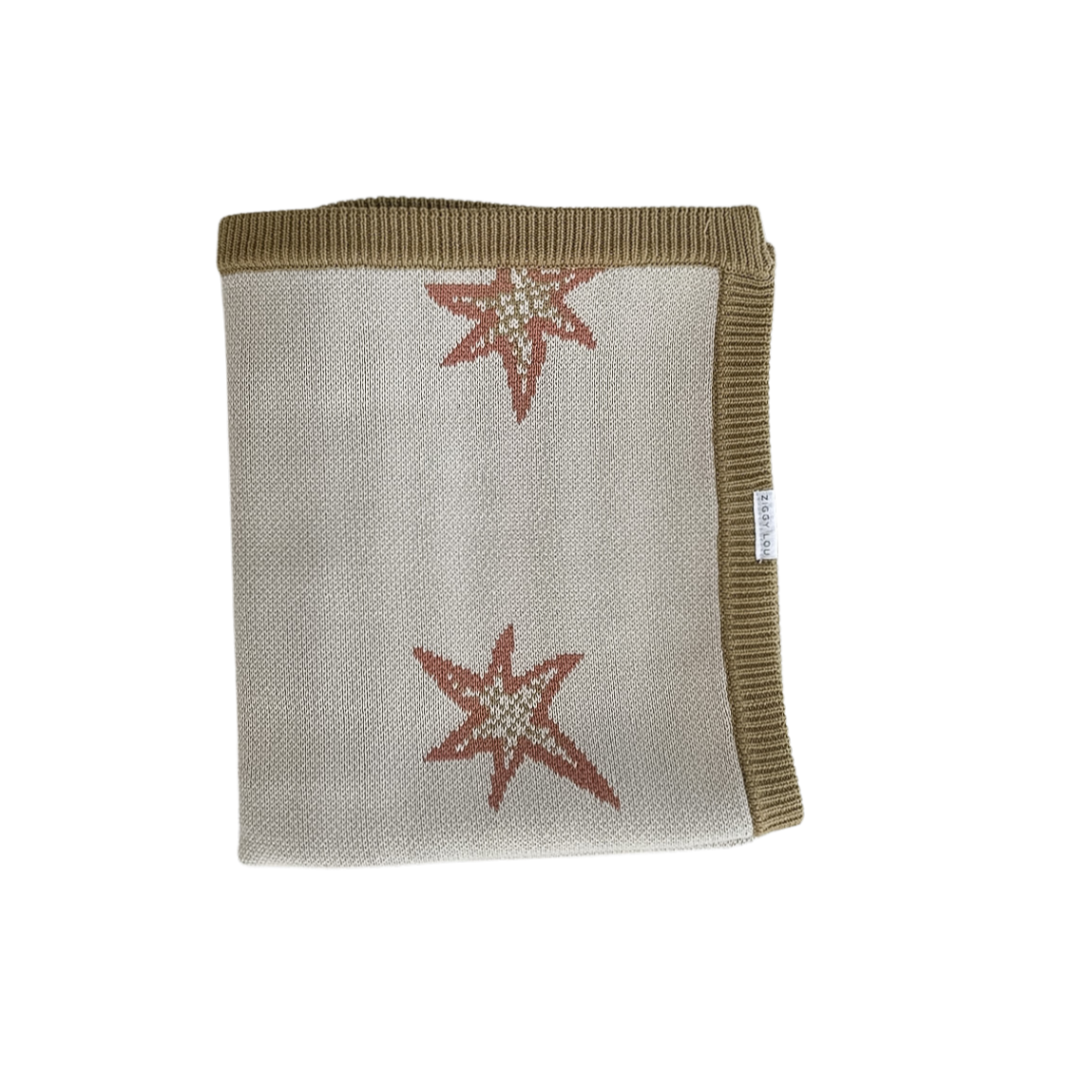 Textured blanket with star patterns on a white background