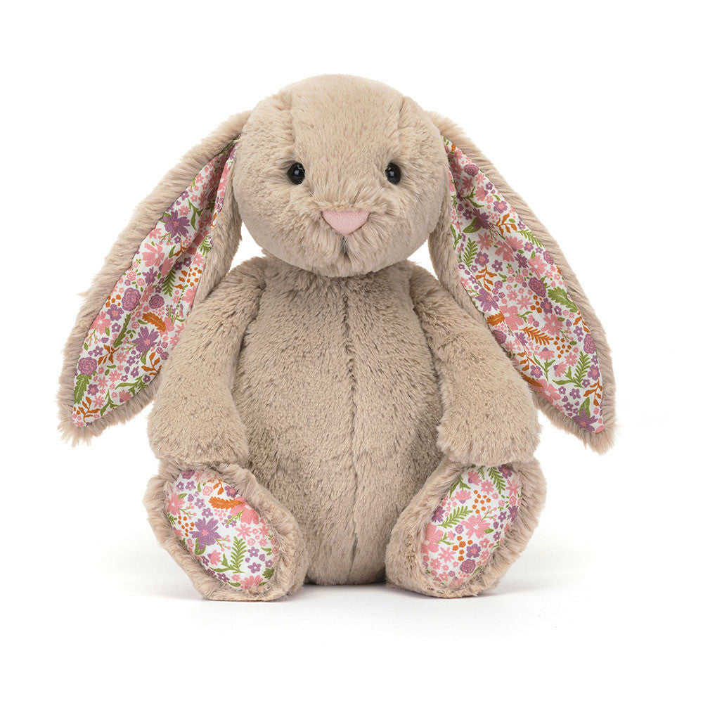 Plush bunny toy with floral ears and paws on a white background