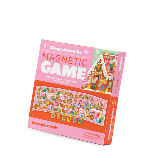 Gingerbread Go Magnetic Game box by Crocodile Creek, featuring a pink and orange design with illustrations of gingerbread houses and a game board.