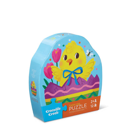 Crocodile Creek Easter egg puzzle packaging with a chick and flowers on a white background