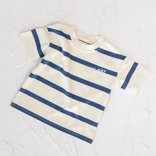 Striped shirt with text on a textured white background