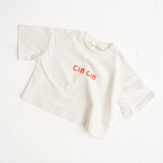 White t-shirt with red text on a white background