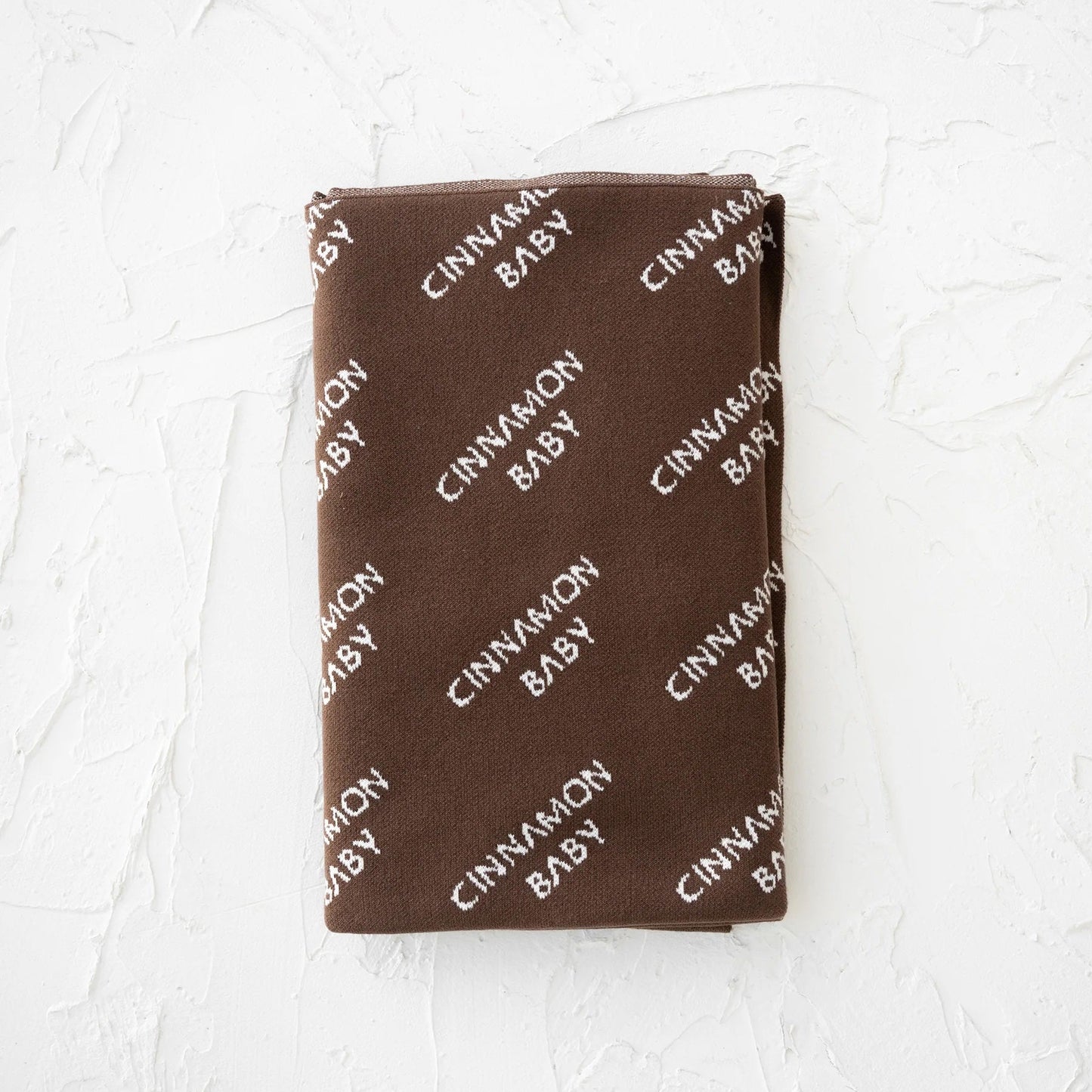 CINNAMON BABY KNITTED LOGO BLANKET - DARK CHOCOLATE