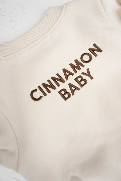 CINNAMON BABY LOGO ROMPER - CREAM