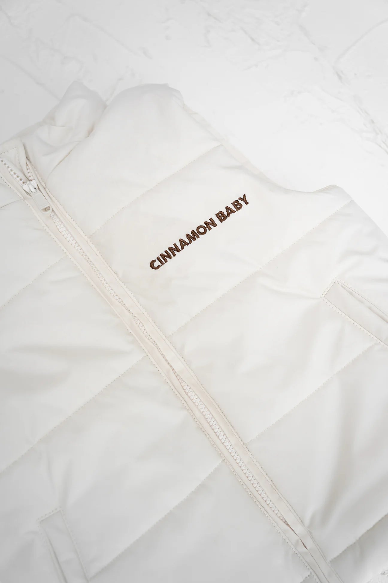 CINNAMON BABY PUFFER VEST - BEIGE
