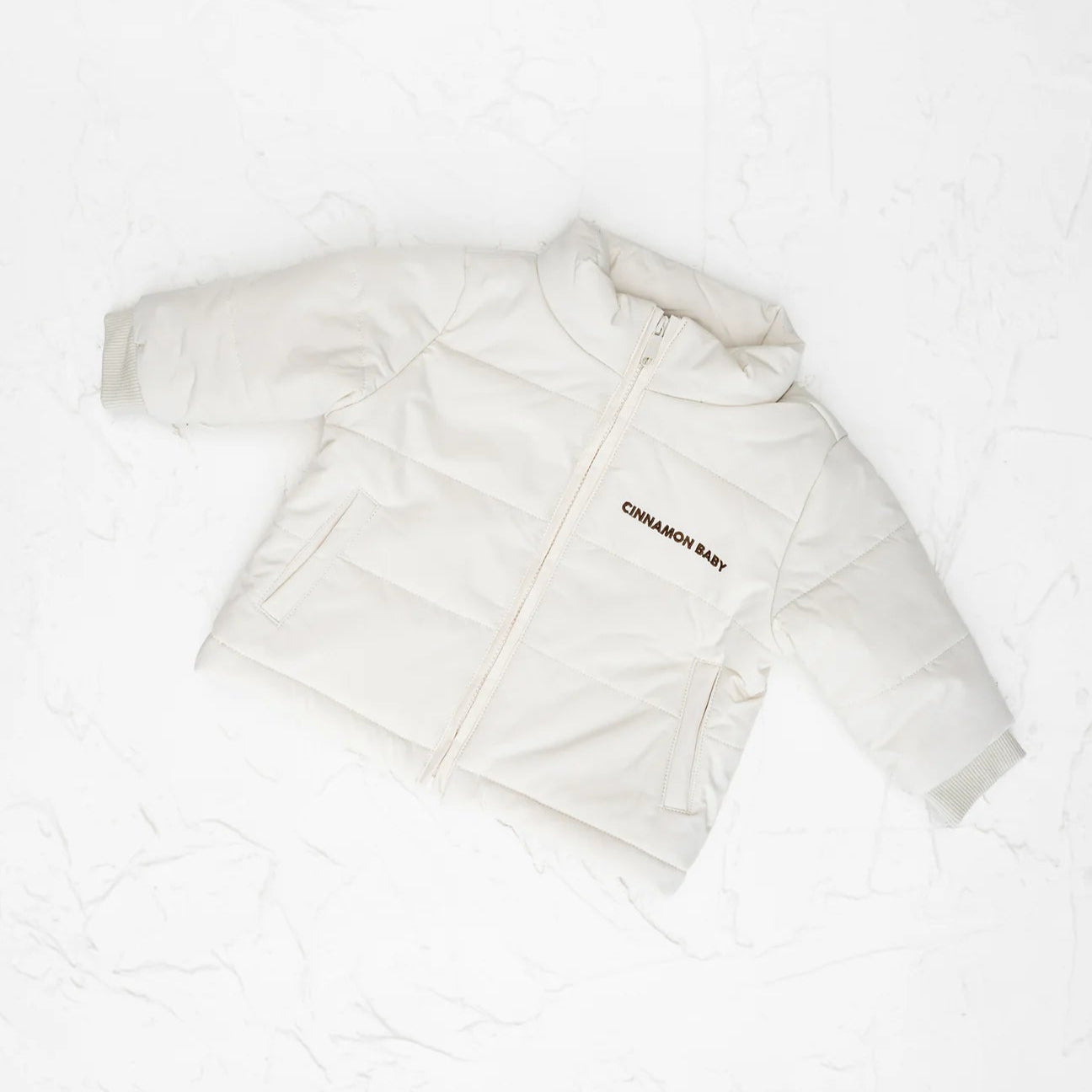 CINNAMON BABY PUFFER JACKET | BEIGE