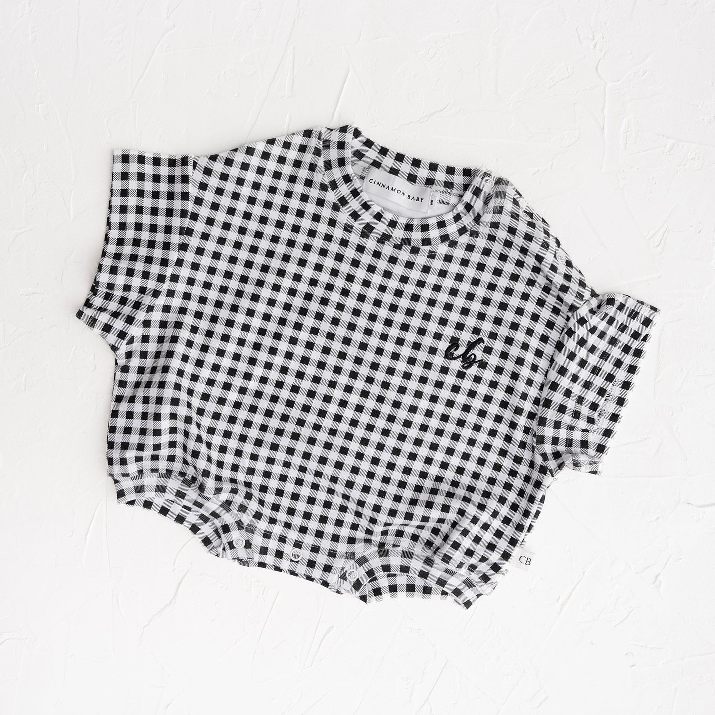 Black and white checkered shirt on a white background