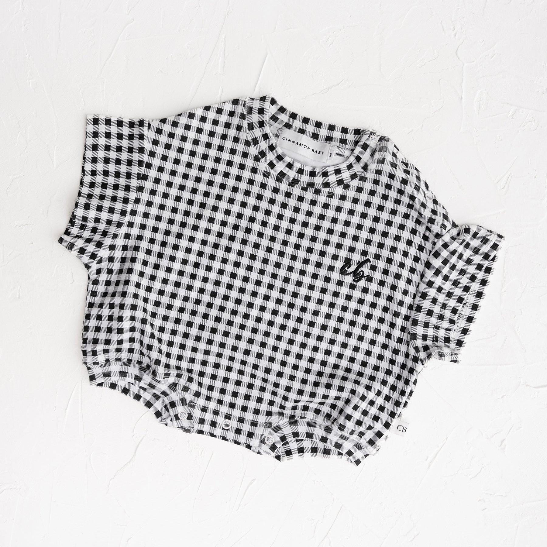Black and white checkered shirt on a white background