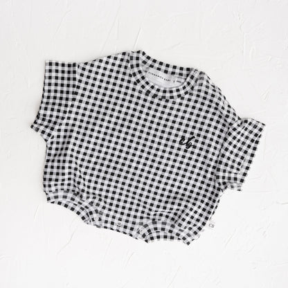 Black and white checkered shirt on a white background