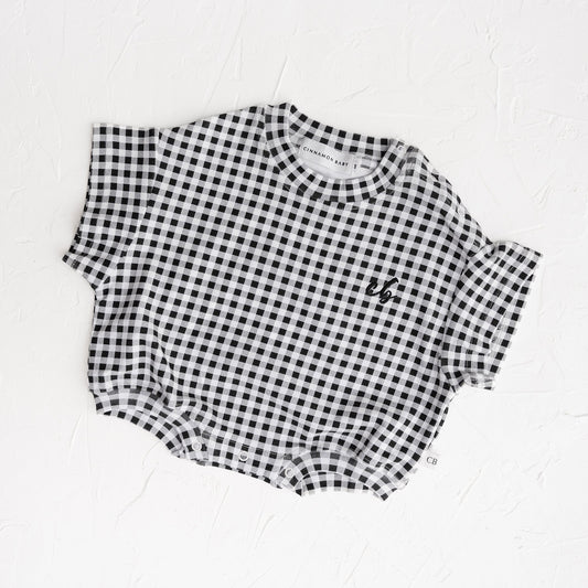Black and white checkered shirt on a white background