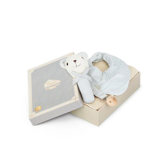 Baby gift set with teddy bear and outfit in a box on a white background