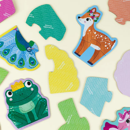 Colorful animal-shaped stickers on a light background