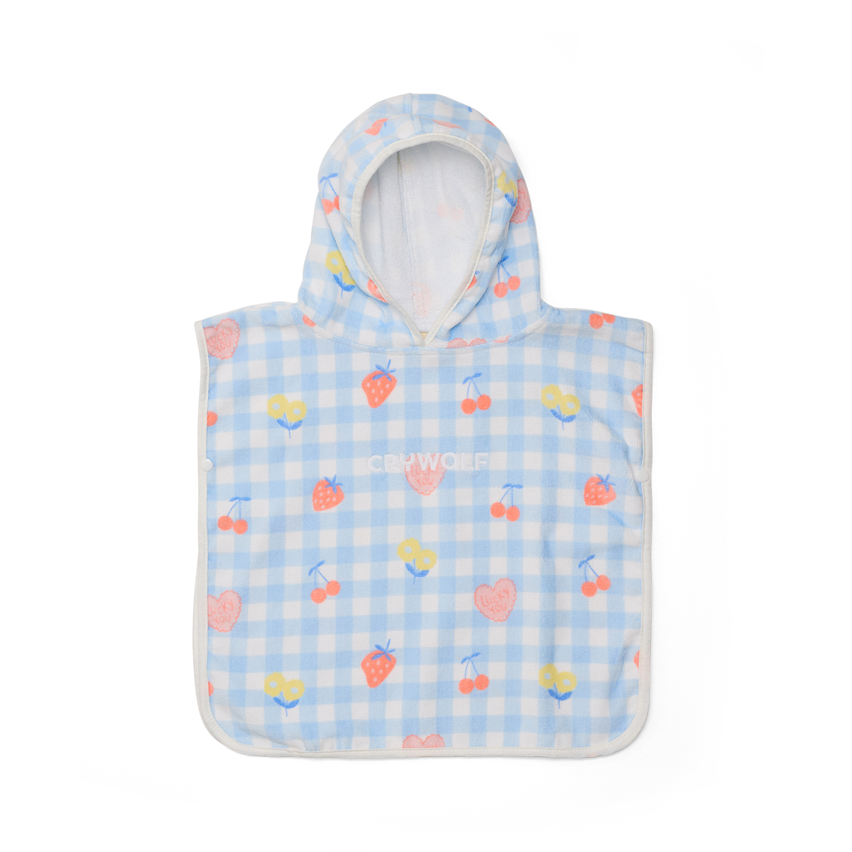 Children's poncho with hood and cherry pattern on a blue checkered background