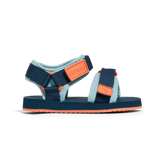 Navy and orange sandal on a white background