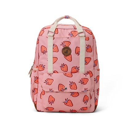 Pink backpack with strawberry pattern on a white background