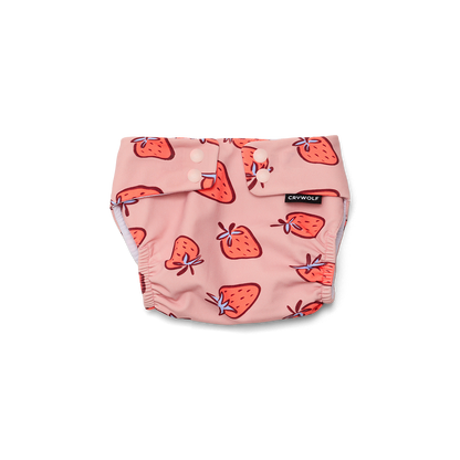 Pink diaper with strawberry pattern on a white background
