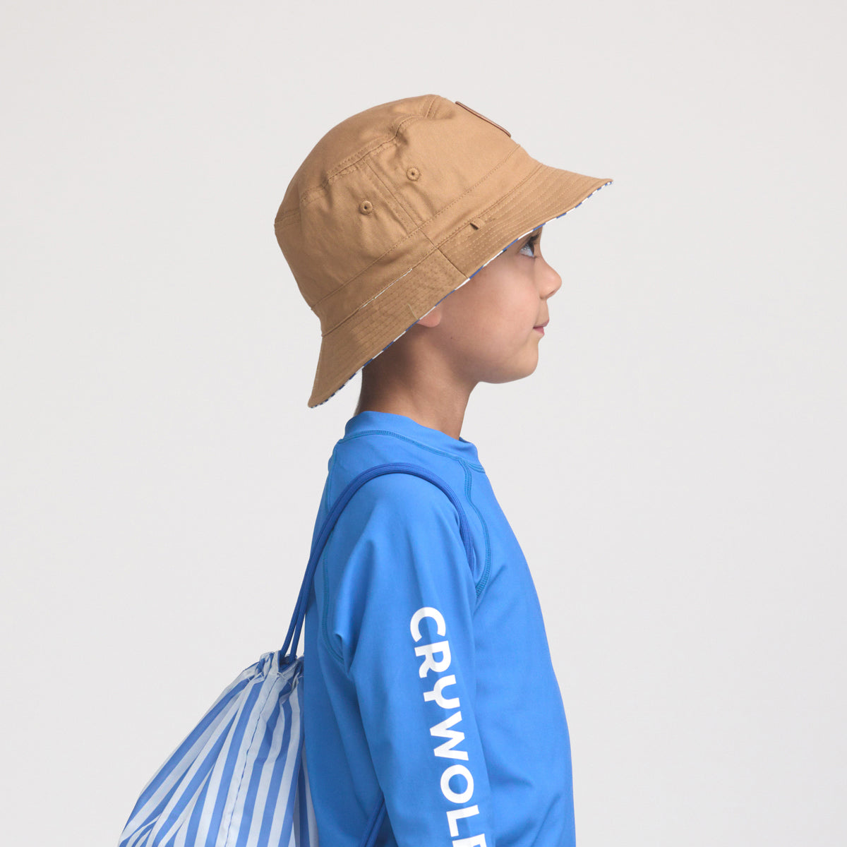 CRYWOLF REVERSIBLE BUCKET HAT | DEEP SEA STRIPE