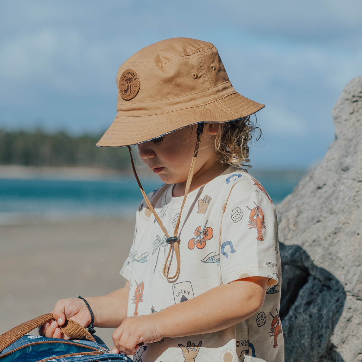 CRYWOLF REVERSIBLE BUCKET HAT | DEEP SEA STRIPE